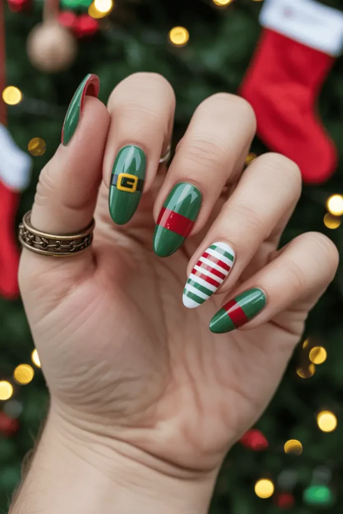 green and red elf costume nails with belts, collars, stripes, cute elf-inspired design, festive background with toys or stockings, warm Christmas lights, realistic hands