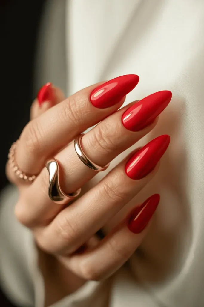Fire Engine Red On Long Almond Nails