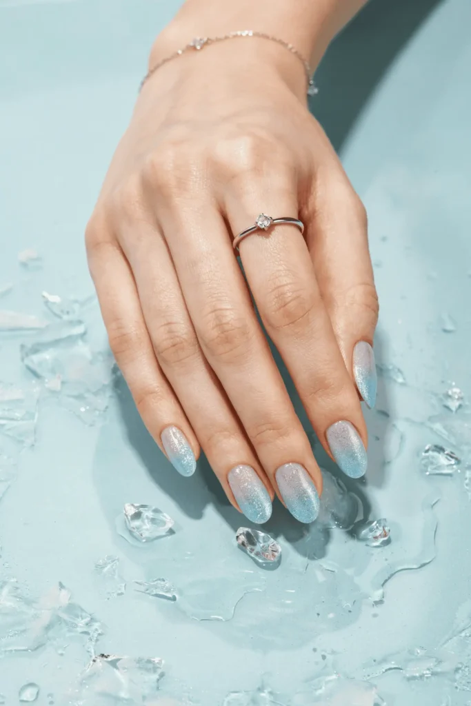Baby Blue to Silver Glitter Ombre on Oval Nails