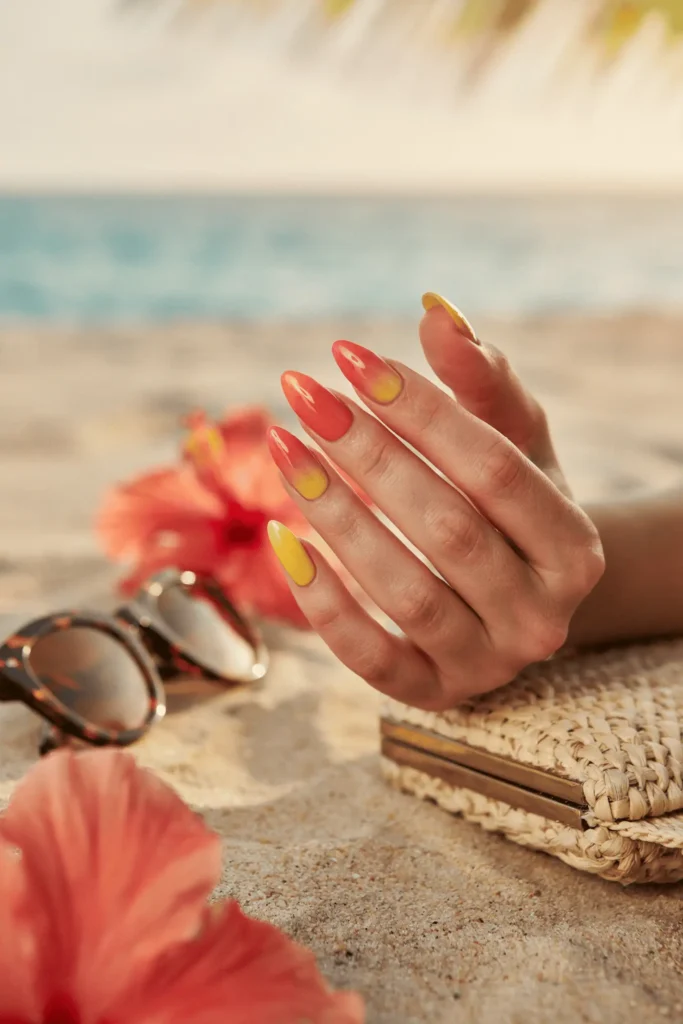 Sunset Ombre with Orange, Pink, and Yellow on Stiletto Nails