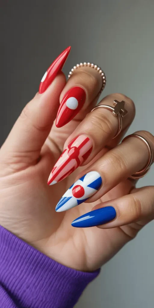 Terrify in style with clown-inspired designs. Use bold colors, teardrop shapes, and graphic patterns for a nail look thatโs circus-chic.